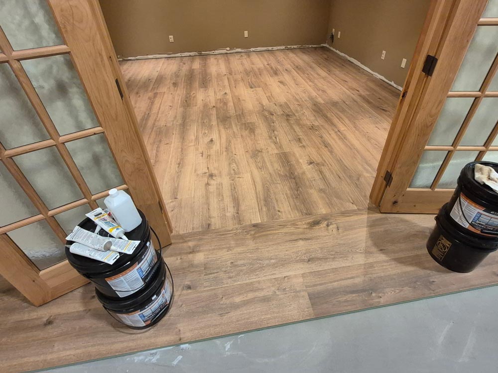 Photo of an in process hardwood floor installation by LINQ Flooring in Vernon, BC